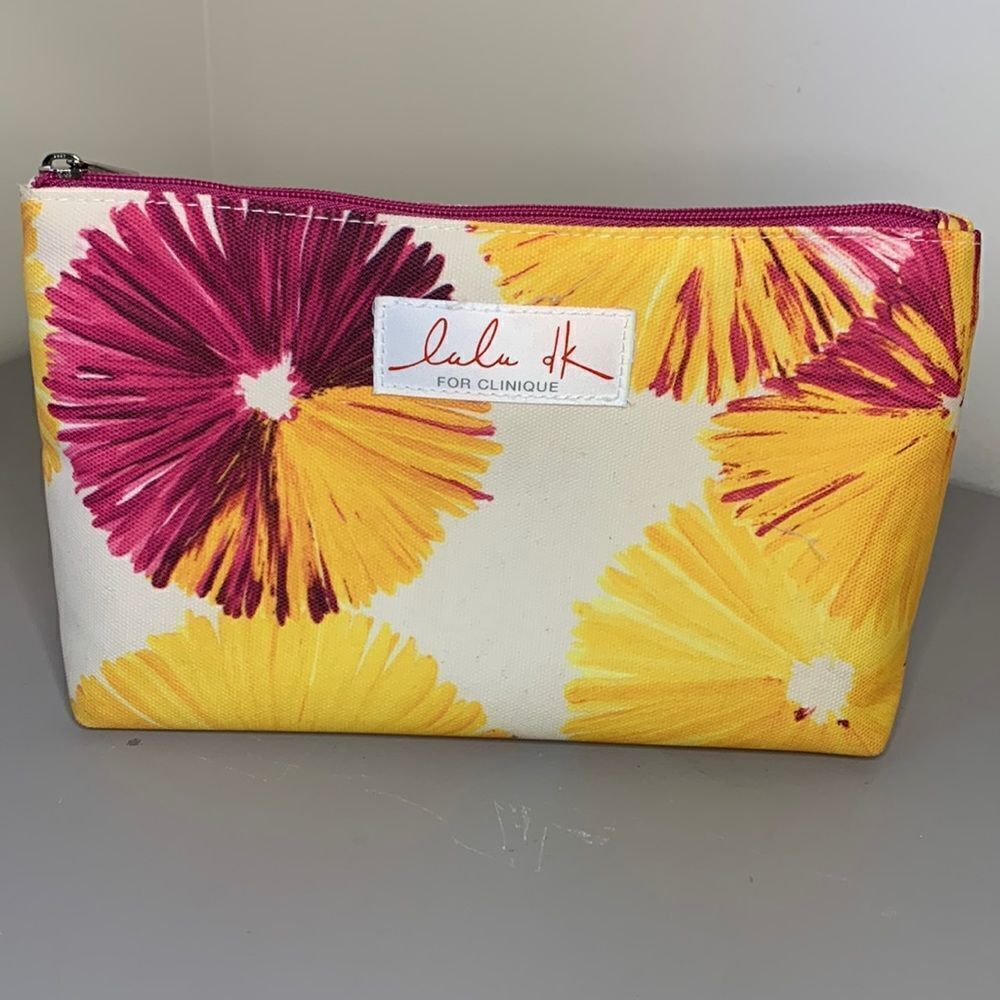 EUC Clinique LaLa DK makeup bag